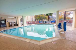 a large swimming pool in a large building at Drury Inn & Suites Houston Galleria in Houston