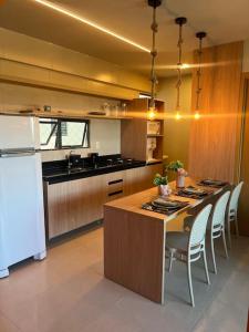 Una cocina o kitchenette en Apartamento 2/4 no Francês