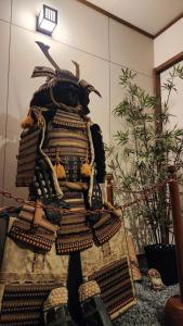 a large stack of objects in a room at Hida Takayamasan no machi House - Vacation STAY 98088v in Takayama