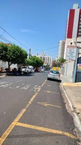 a car parked on the side of a city street at Wana casa 4 -Requinte e Conforto in Sao Jose do Rio Preto