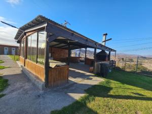 a small building in the middle of a field at Arriendo de casa 9 personas con piscina in La Serena