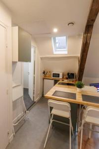 Kuchyň nebo kuchyňský kout v ubytování Lafra 3 - Charmant & Intimiste - Mon Groom + 21 fotografií