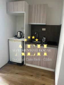 a kitchen with a counter with stars on it at El Hogar - Sucursal Calle Beni - Edificio Auriga 272 con Garaje cubierta in Cochabamba