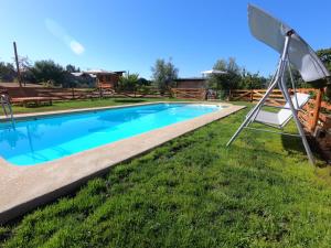 A piscina em ou perto de Cabaña Refugio Magenta