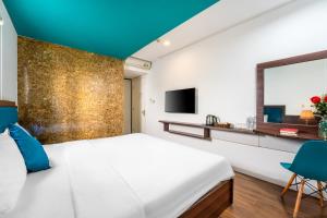 TV a/nebo společenská místnost v ubytování Rich Hotel