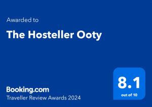 una caja azul con el texto actualizado al anfitrión oody en The Hosteller Ooty, en Ooty