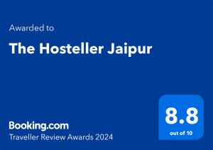 Certifikat, nagrada, logo ili neki drugi dokument izložen u objektu The Hosteller Jaipur