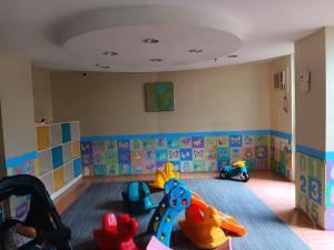 a childs play room with toys on the floor at Toledo Jungle, Tropicana Garden City, Sumulong Highway, Marikina City, 1800 in Manila