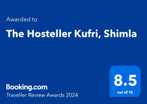 a blue screen with the words the hosteliter kittitt shirm at The Hosteller Kufri, Shimla in Kūfrī