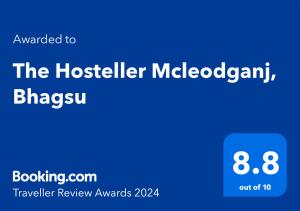 麥羅肯機的住宿－The Hosteller Mcleodganj, Upper Bhagsu，手机的屏幕,与三轮车切斯特旅馆