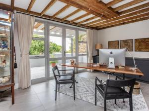 an office with a desk with a computer on it at Bluemari's Retreat in Hout Bay