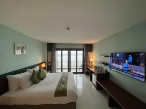 Μια τηλεόραση ή/και κέντρο ψυχαγωγίας στο Siam Triangle Hotel Chiang Sean