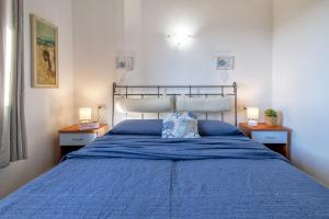 Кровать или кровати в номере Casa Nuages
