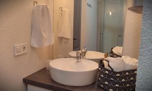 Kúpeľňa v ubytovaní Koller Apartmanház