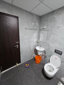 Koupelna v ubytování THAAL RESIDENCY Cheruvathur-HALA GROUPS