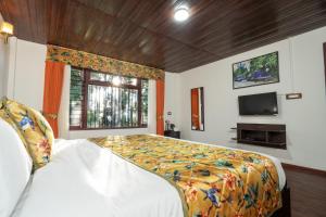 Summit Sherpa Mountain Hotel & Spa客房内的一张或多张床位