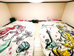Postel nebo postele na pokoji v ubytování メゾンクレスタ + 20 fotografií
