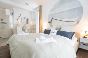 Postel nebo postele na pokoji v ubytování Residenz - Haus Wasser - Penthouse - Sauna - Parkplatz
