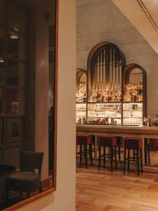 Reštaurácia alebo iné gastronomické zariadenie v ubytovaní Hotel Pulitzer Barcelona