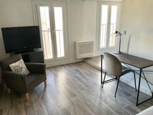 Μια τηλεόραση ή/και κέντρο ψυχαγωγίας στο T2 Tout confort centre ville