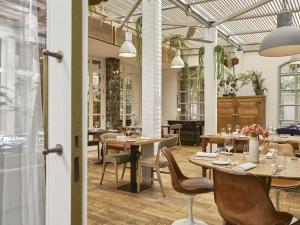 Reštaurácia alebo iné gastronomické zariadenie v ubytovaní Hotel Pulitzer Barcelona