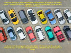 a group of cars parked in a parking lot at Villaggio Passo Dell'Arciprete in Vieste