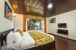 Summit Sherpa Mountain Hotel & Spa客房内的一张或多张床位