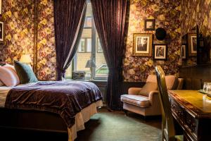 Voodi või voodid majutusasutuse Hotel Pigalle toas