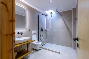 Koupelna v ubytování ANGONI SUITES