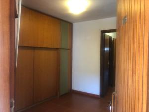 an empty room with a closet and a door at Residence Napoleon Isola D'Elba in Procchio