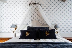 Postel nebo postele na pokoji v ubytování Sundvolden Hotel