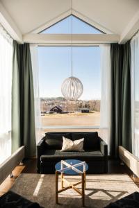 Posezení v ubytování Sundvolden Hotel