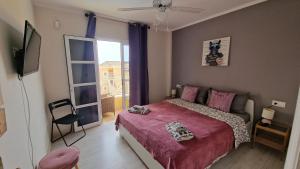 Posteľ alebo postele v izbe v ubytovaní Residencial Benimar Licencia Vv + 19 fotografií