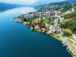 an aerial view of a small island in a lake at Hotel Nikolasch in Millstatt