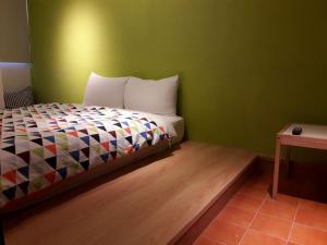 Llit o llits en una habitació de Bo Bo Bear B&B