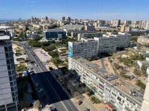 an aerial view of a city with tall buildings at ЖК Три короны in Aktau