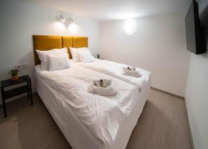Posteľ alebo postele v izbe v ubytovaní Free Parking -Corvin Palace Residence-3BDRM,6ppl,Wifi,AC