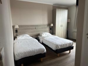 Postel nebo postele na pokoji v ubytování Hotel Arriate