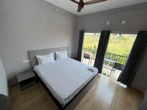 Voodi või voodid majutusasutuse Rock View Resort toas