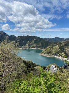 a view of a lake in the middle of a mountain at Jomine Koen Campjo - Vacation STAY 85267v in Minano