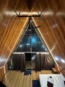 a view from the inside of a boat with a ceiling at Lotuslap Resort in Rehti