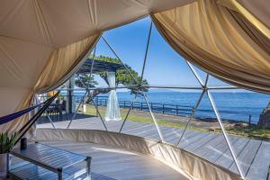 a tent with a view of the ocean at La-gum - Vacation STAY 23965v in Inatori