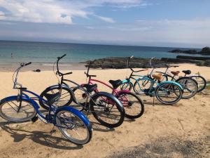 a row of bikes parked on the beach at Grand Beach - Vacation STAY 23981v in Iki