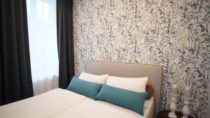 Postel nebo postele na pokoji v ubytování Hotel Böke Lörrach