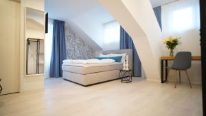 Postel nebo postele na pokoji v ubytování Hotel Böke Lörrach