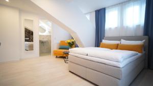 Postel nebo postele na pokoji v ubytování Hotel Böke Lörrach + 6 fotografií