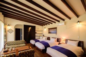 En eller flere senge i et værelse på Sense of wonder Yufudake Sanroku Glamping Resort - Vacation STAY 41963v