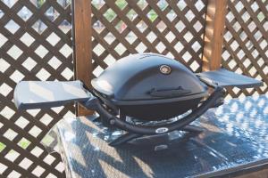 a black helmet sitting on top of a grill at Kanonji City - Camp - Vacation STAY 42258v in Kanonji