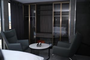 A seating area at プラフィーノリゾートヴィラ
