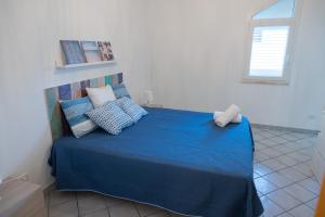 Posteľ alebo postele v izbe v ubytovaní Villa Al Mare Guest House